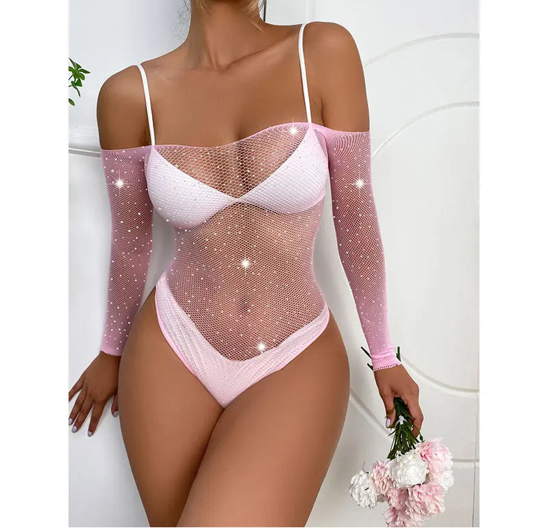 Person wearing a pink sheer bodysuit with long sleeves on a white background