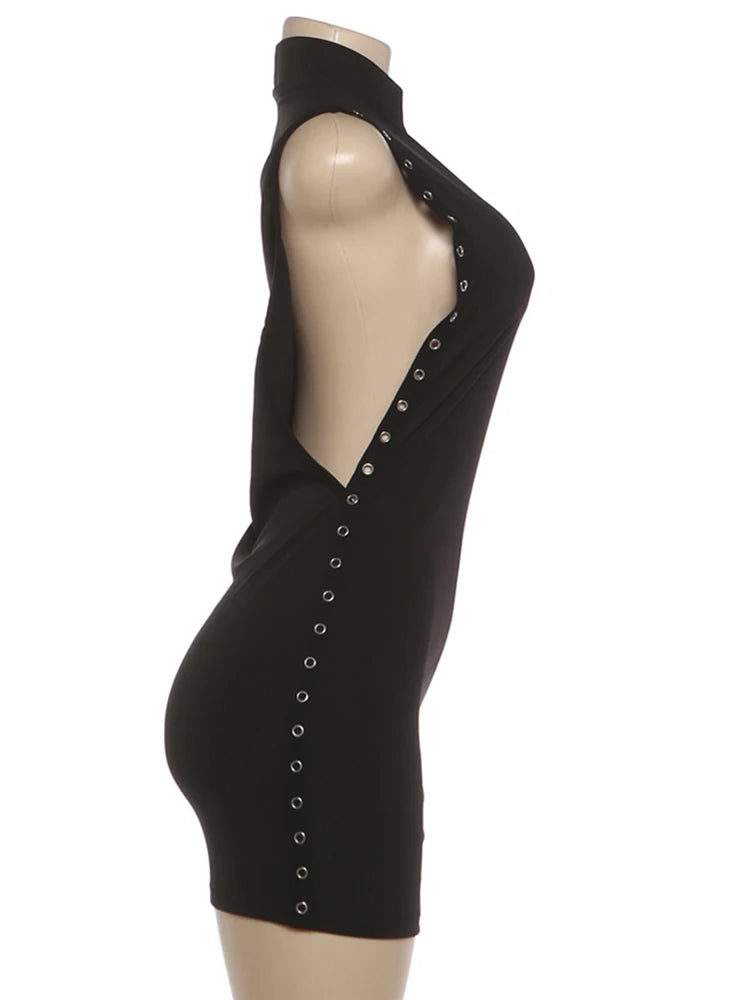 Black dress with cut-out design and button details on a mannequin against a white background