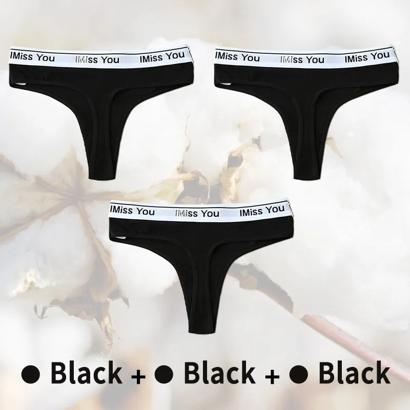 Three black men's underwear with 'I Miss You' waistband on a light background
