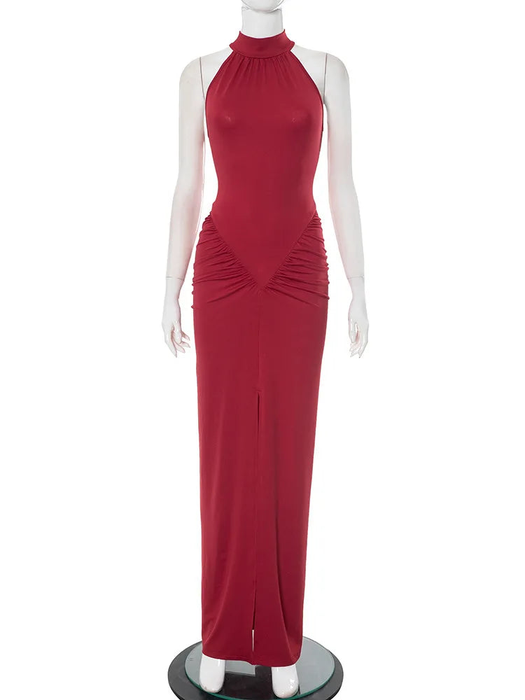 Red evening gown on a mannequin against a white background