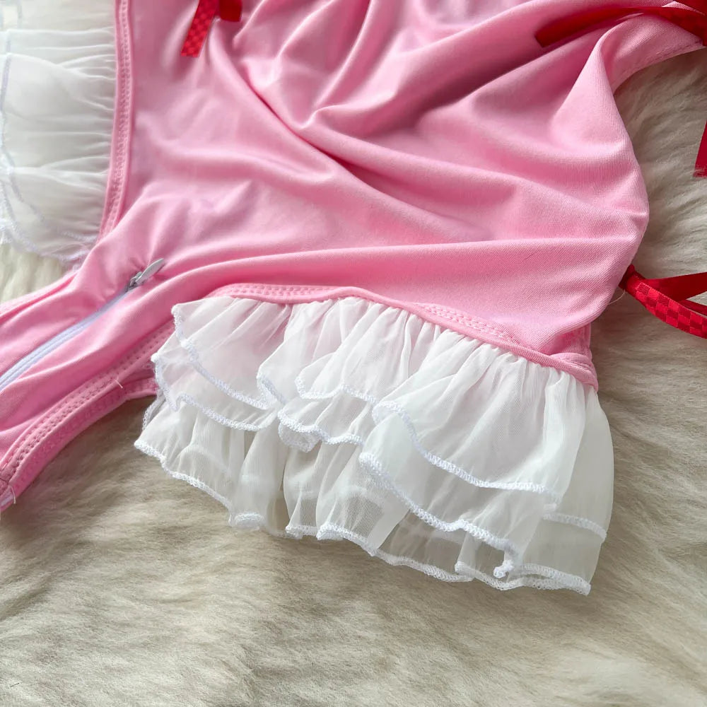 Pink and white ruffled outfit on a fur surface
