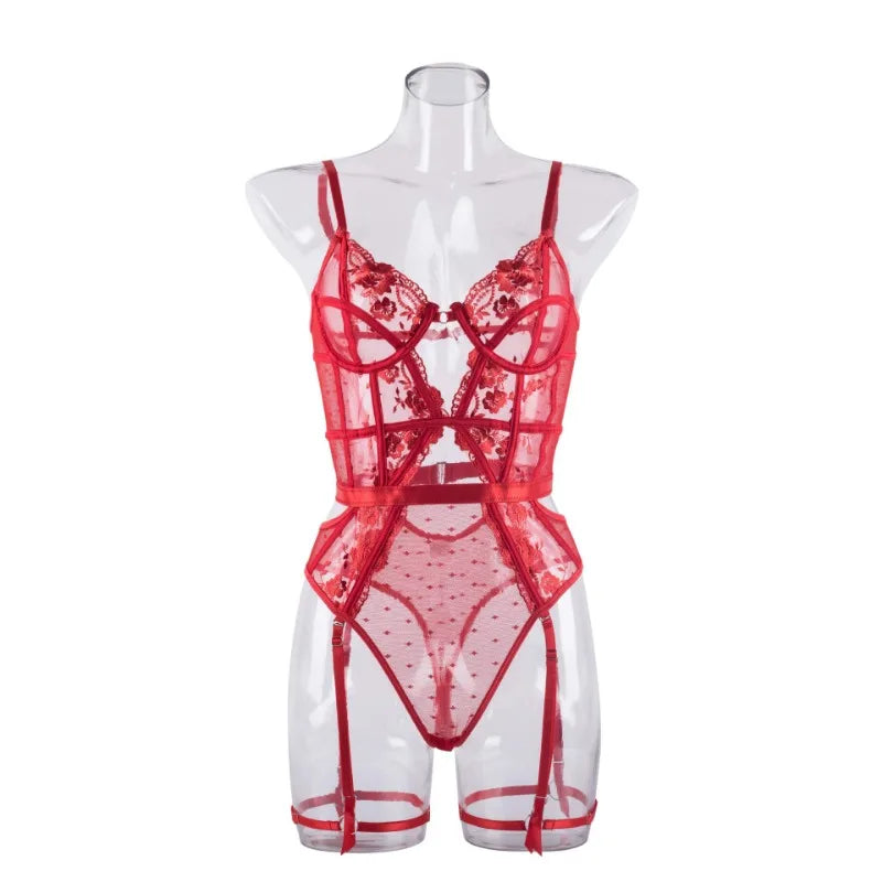 Red lace lingerie set on a mannequin against a white background