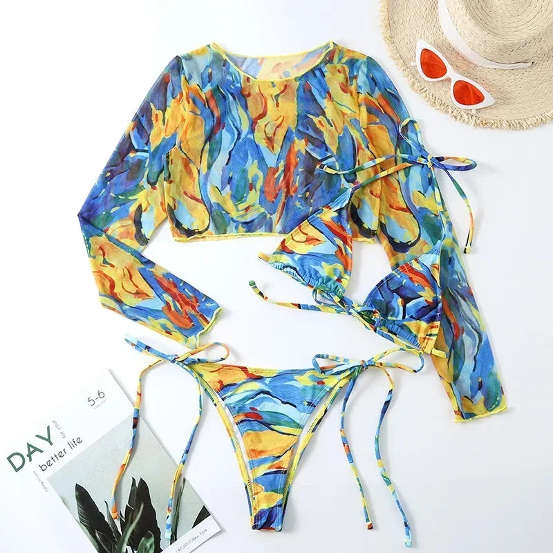 Colorful swimsuit with long sleeves and a hat on a white background