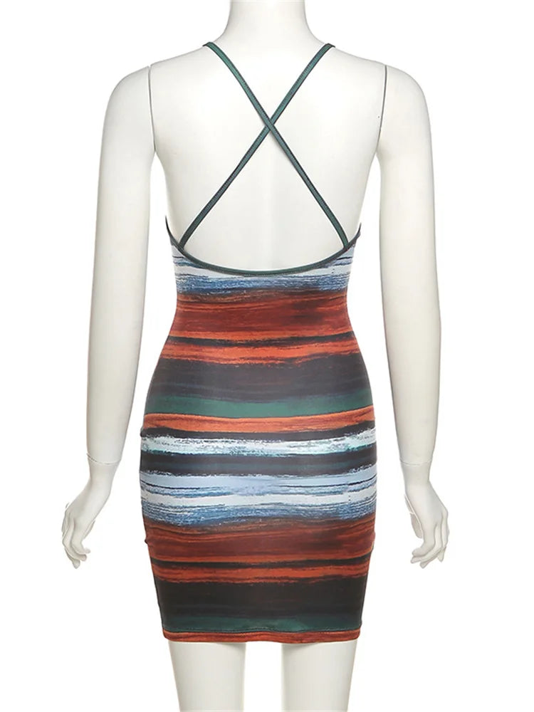 Multicolored striped dress on a mannequin against a white background