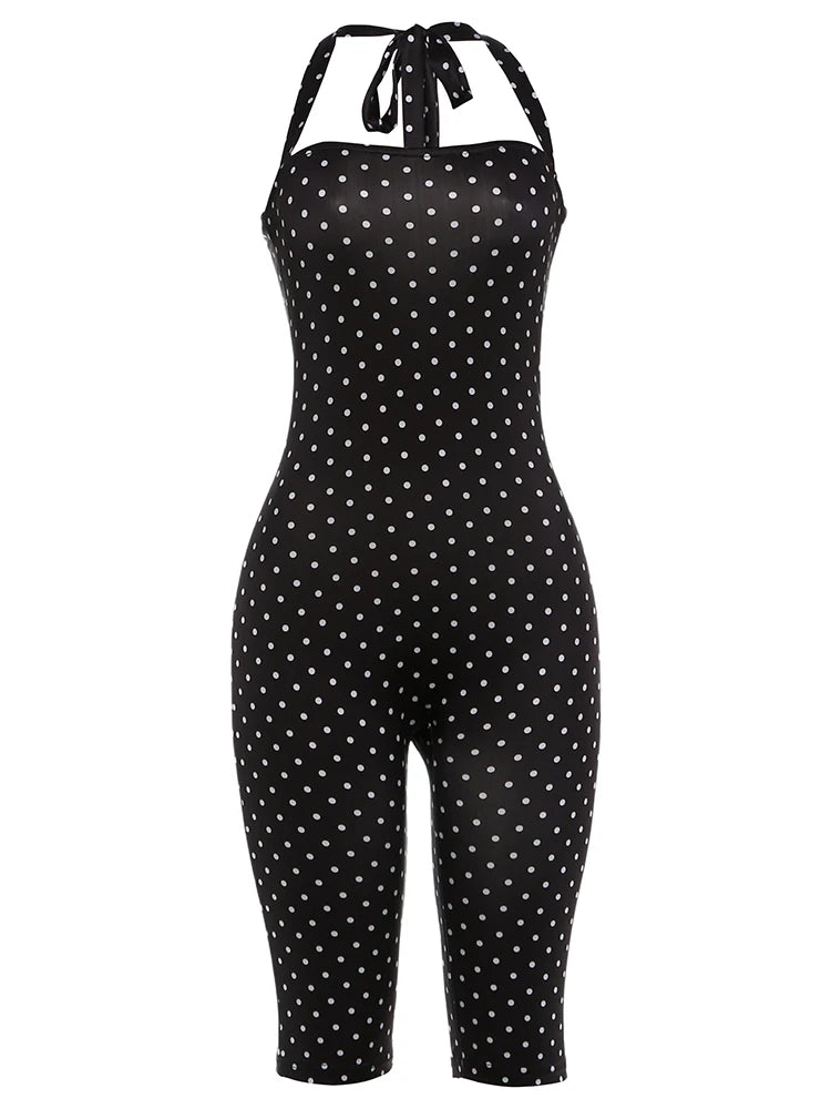 Black polka dot jumpsuit with white dots on a white background