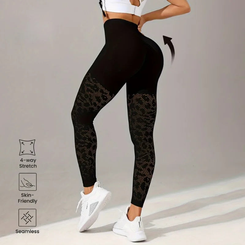 Black patterned leggings worn by a person on a gray background