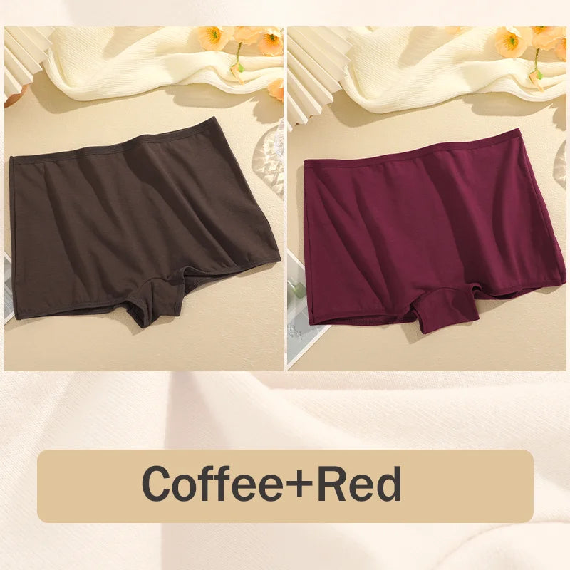 Two pairs of underwear in coffee and red on a beige fabric background.