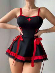 Black and red outfit with a cross detail on a plain background