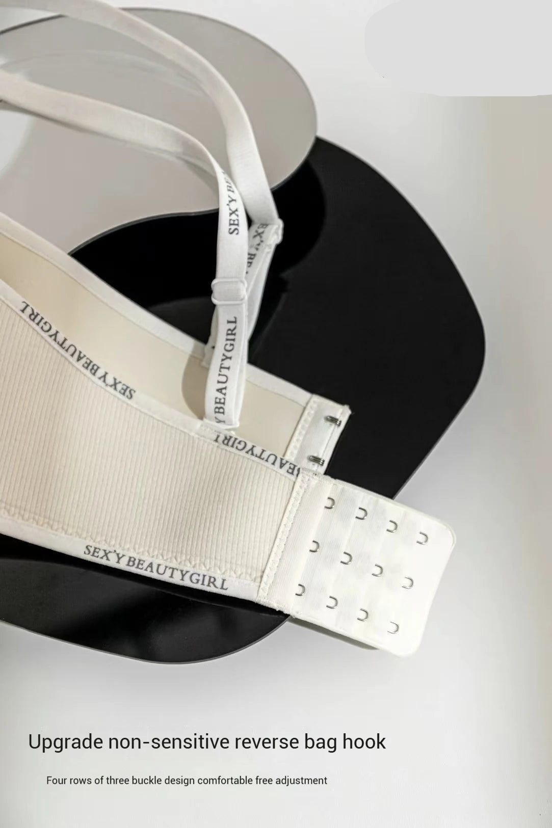 White bra with 'SEXY BEAUTY GIRL' branding on a black and gray background