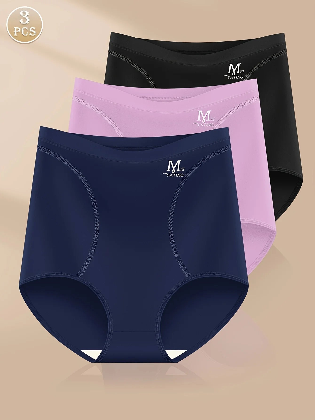 Three pairs of women's underwear in navy, pink, and black on a beige background.
