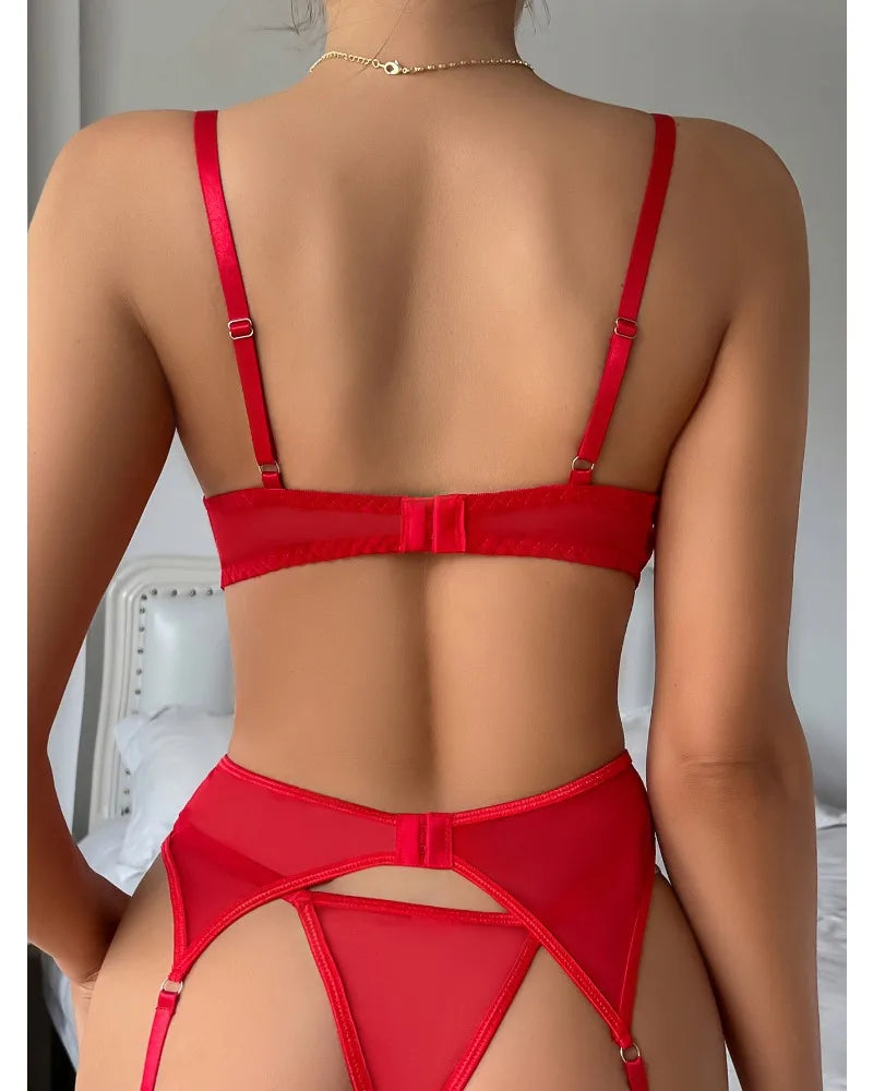 Red bikini set worn by a person against a neutral background