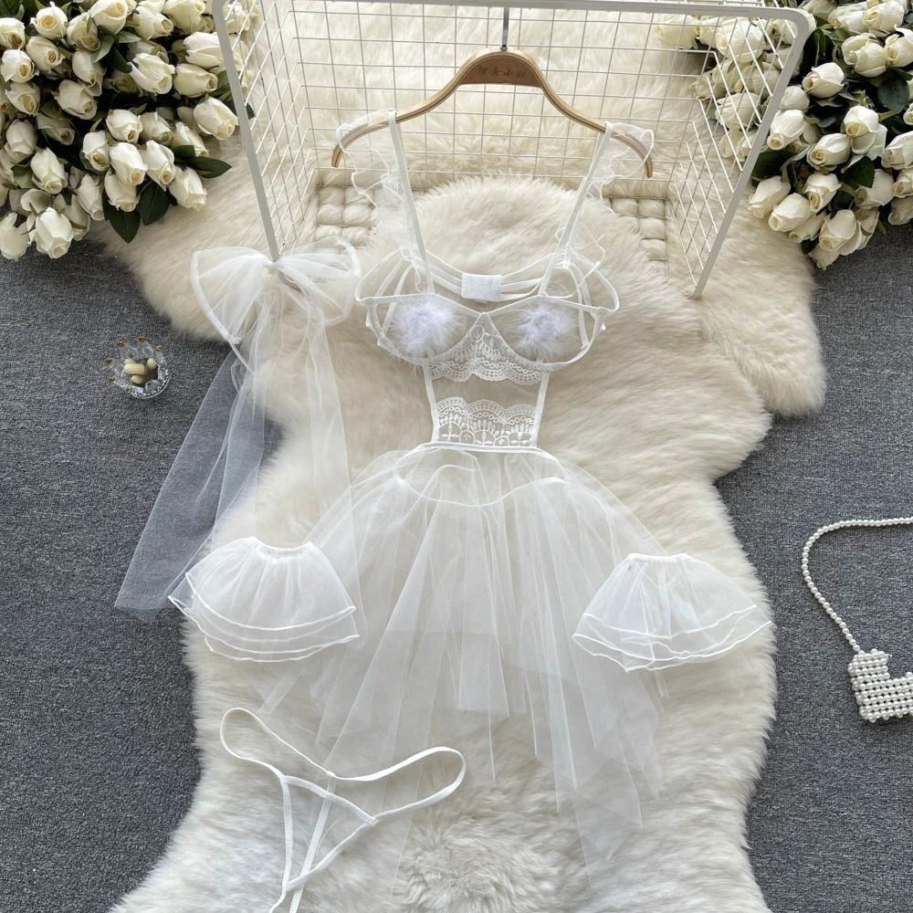 White lace lingerie set on a fur rug with decorative elements