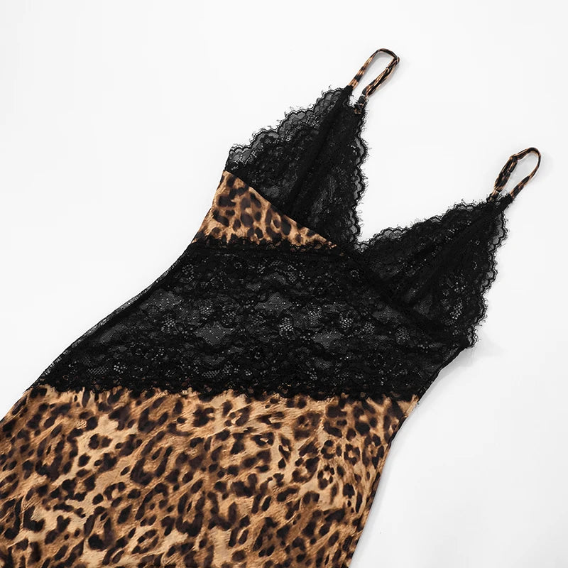 Leopard print slip dress with black lace details on a white background