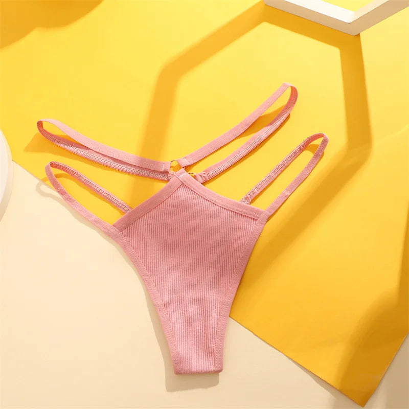 Pink bikini bottom on a yellow background