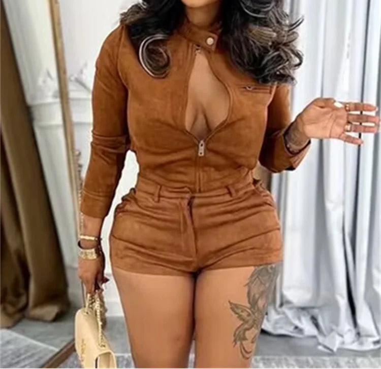 Woman wearing a brown suede outfit in an indoor setting