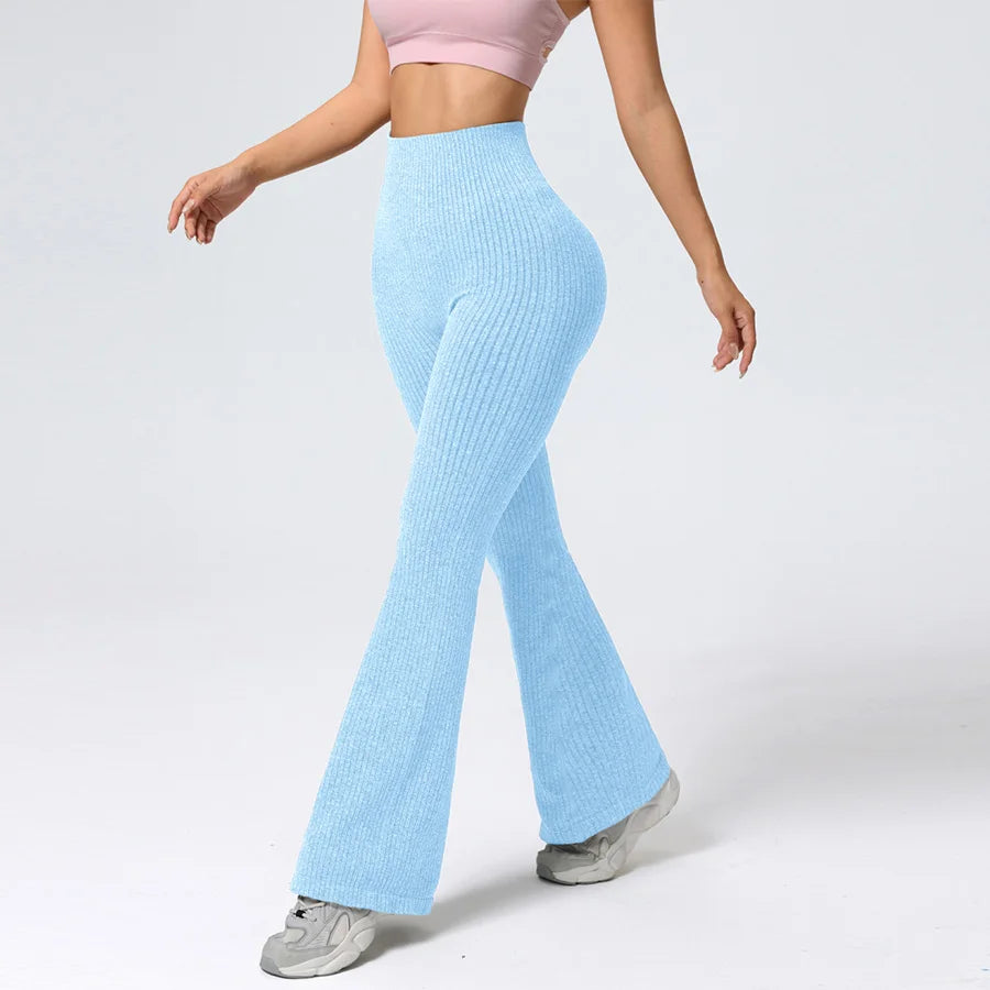 Light blue ribbed leggings worn by a person on a white background