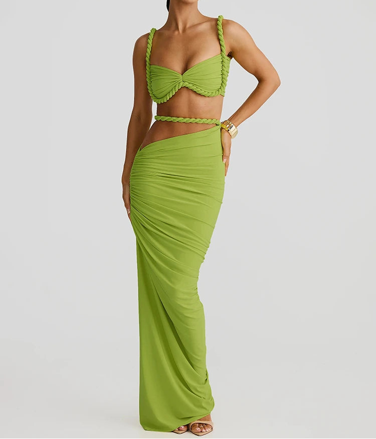 Woman wearing a green dress with a white background