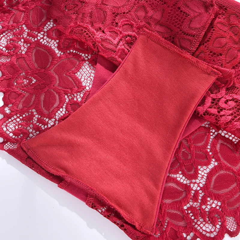 Red fabric pocket square on a red lace fabric background