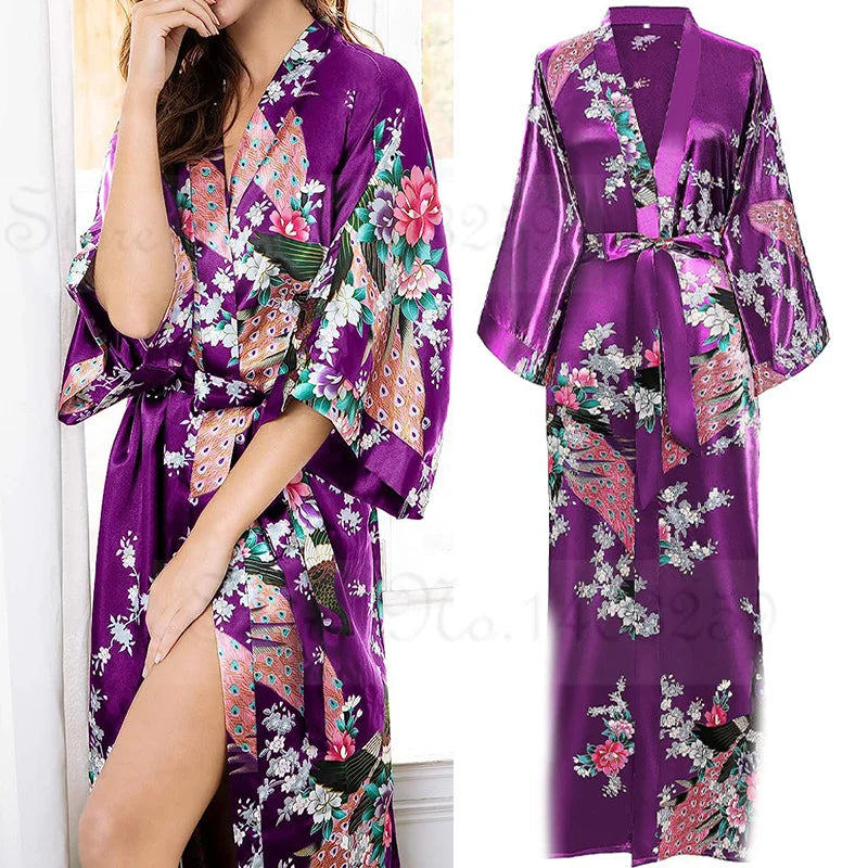 Purple floral satin robe worn by a model with a plain background