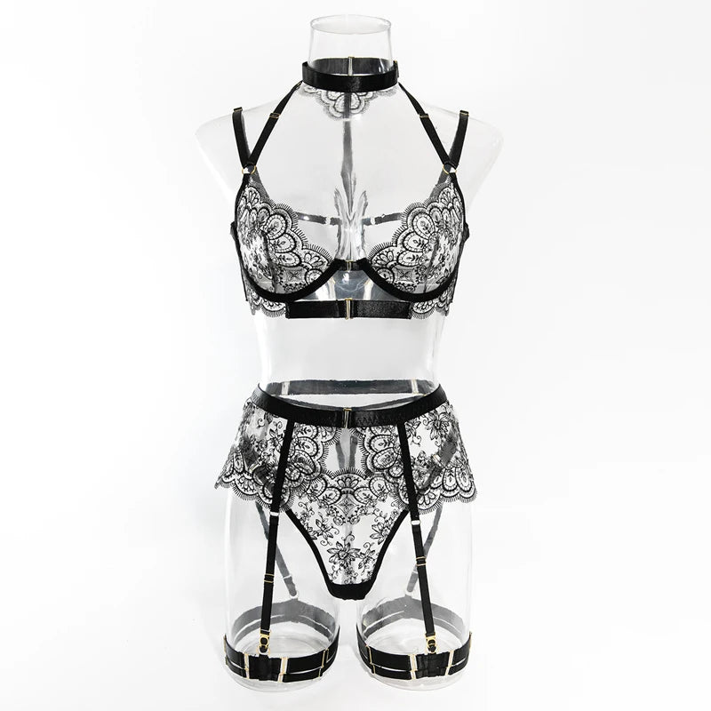 Black lace lingerie set on a clear mannequin against a white background
