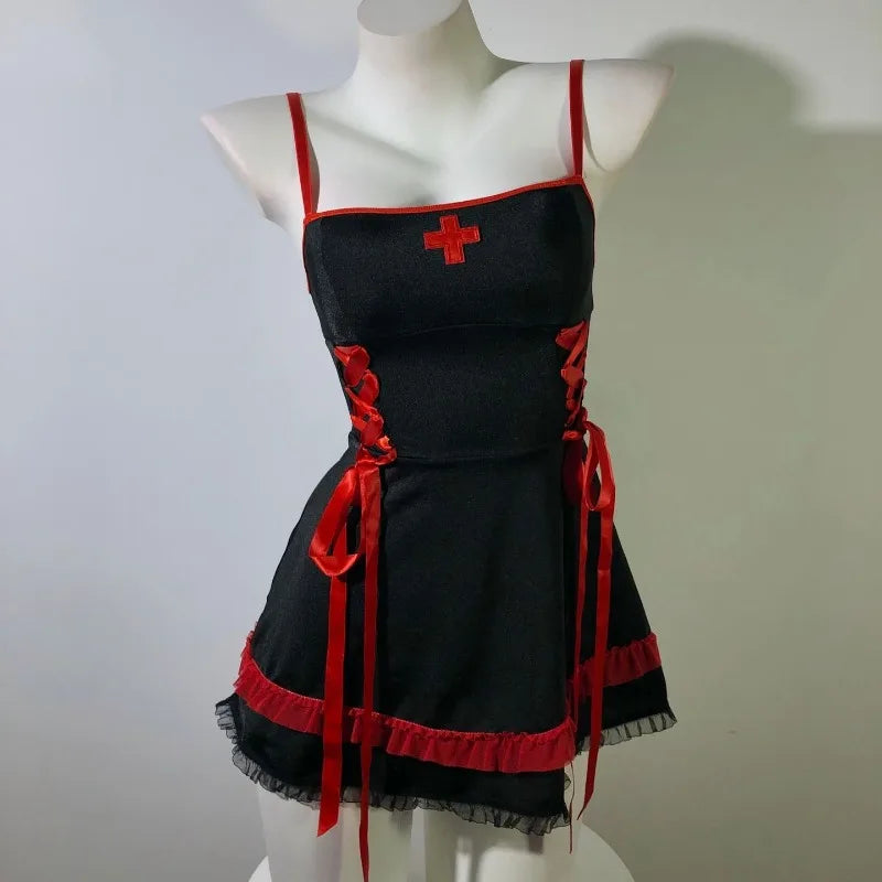 Black apron with red accents on a mannequin against a plain background