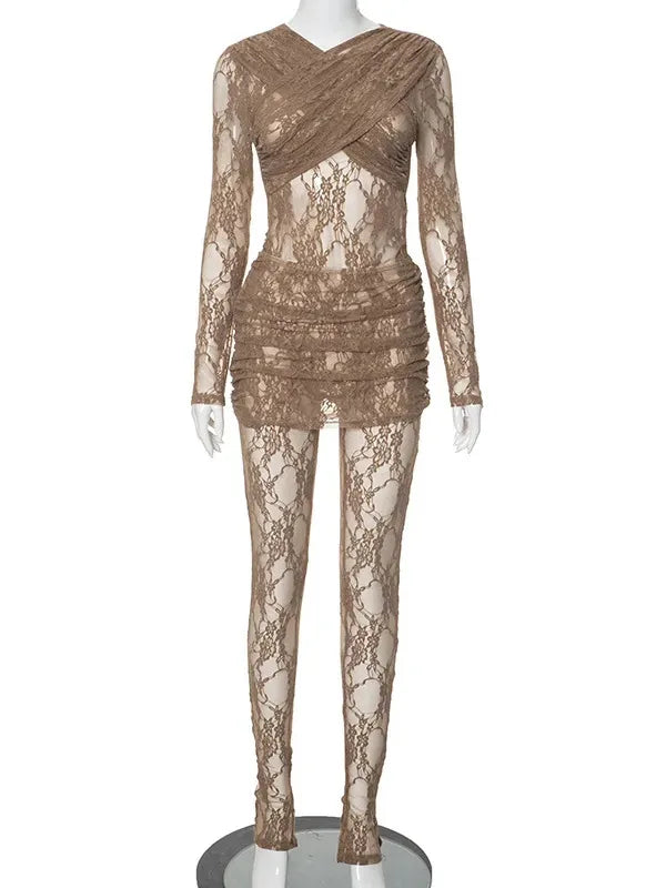Lace dress on a mannequin against a white background