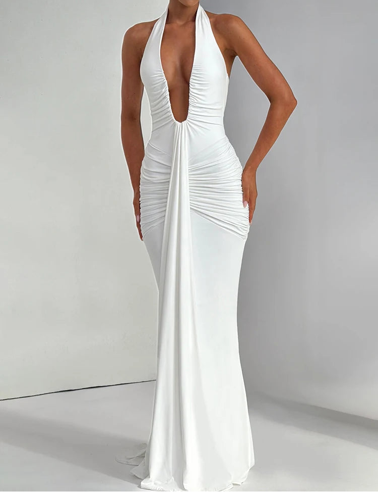 White halter neck gown on a model against a gray background