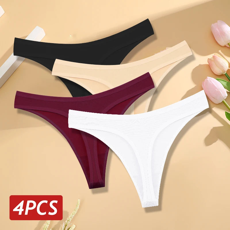 Four pairs of women's underwear in black, beige, red, and white on a beige background with flowers.