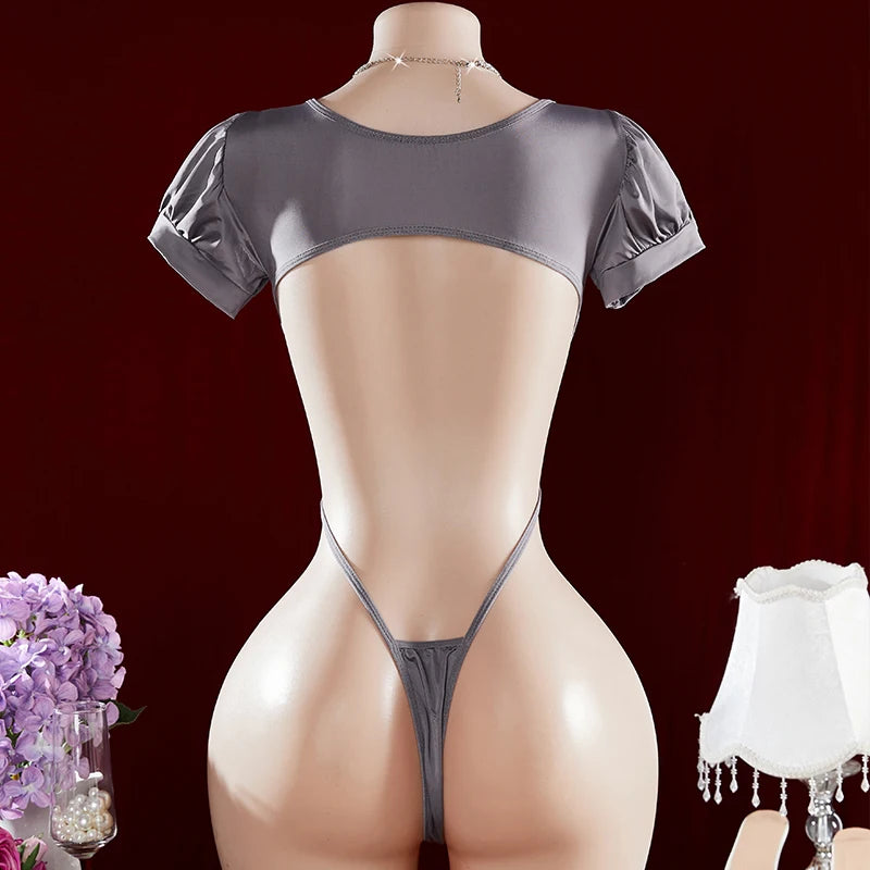 Mannequin wearing a gray bodysuit with a dark red background