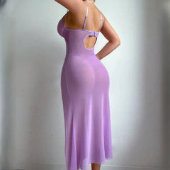 Purple dress with cut-out design on a plain background