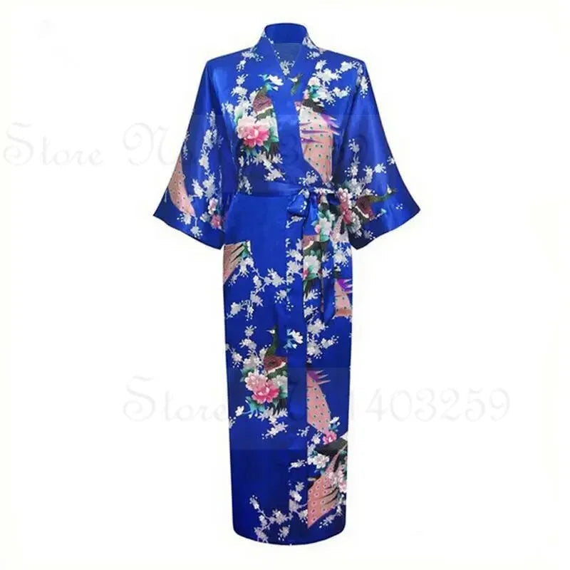 Blue satin robe with floral patterns and a pocket on a white background
