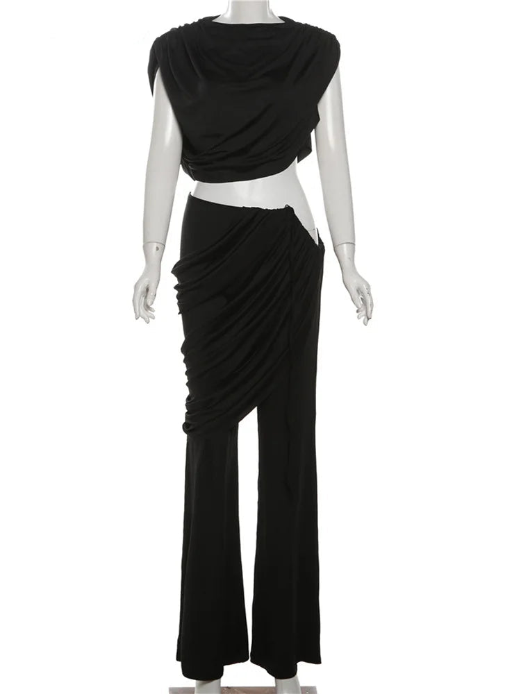 Black draped outfit on a mannequin with 'WeirdPuss' branding.
