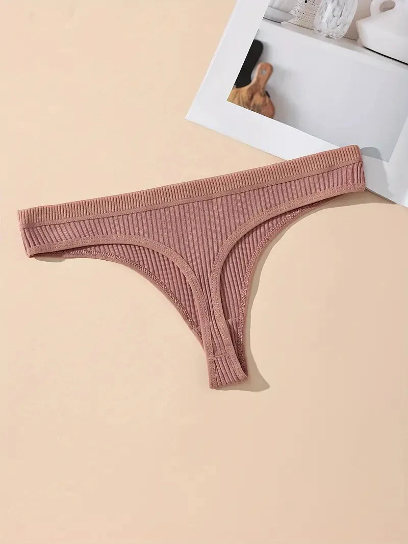 Brown ribbed thong on a beige background