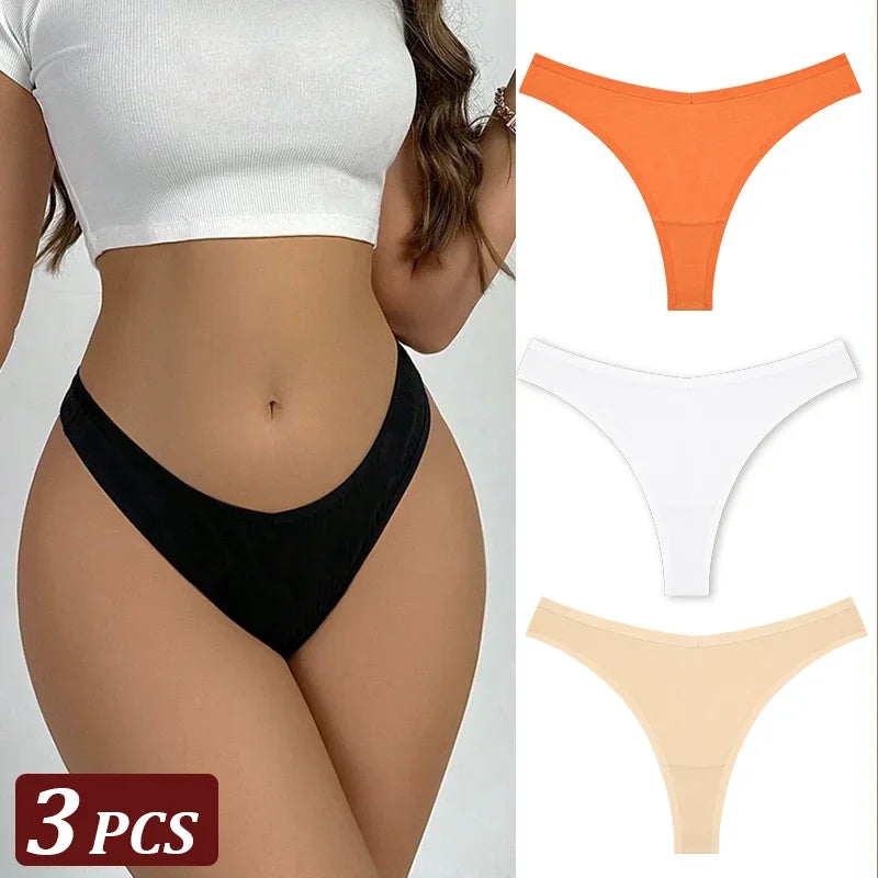 Woman wearing black underwear with inset images of orange, white, and beige panties.