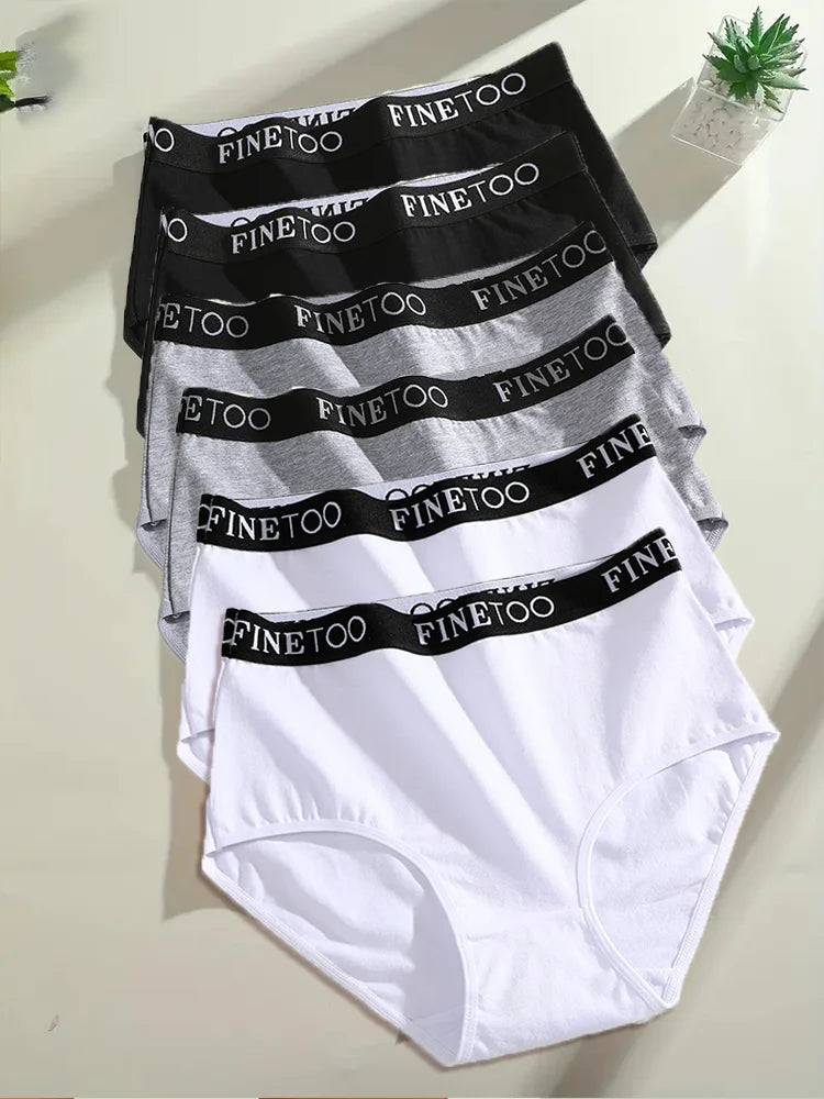 Stack of white underwear with black 'FINEtoo' waistbands on a light background