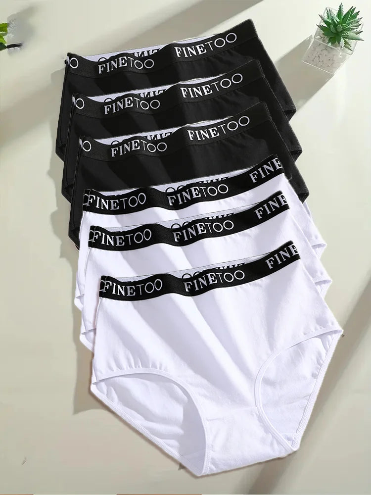 Set of black and white underwear with 'FINE TOO' branding on a light background