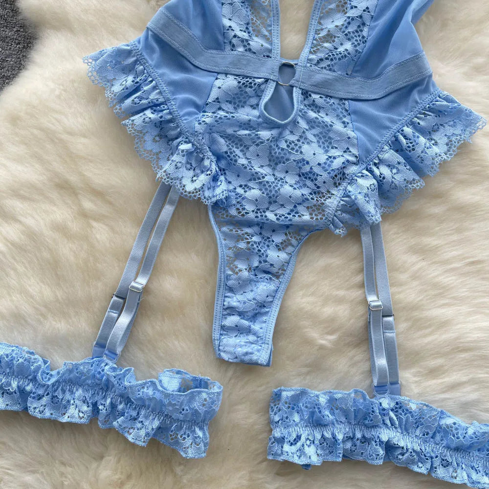 Blue lace lingerie set on a beige surface
