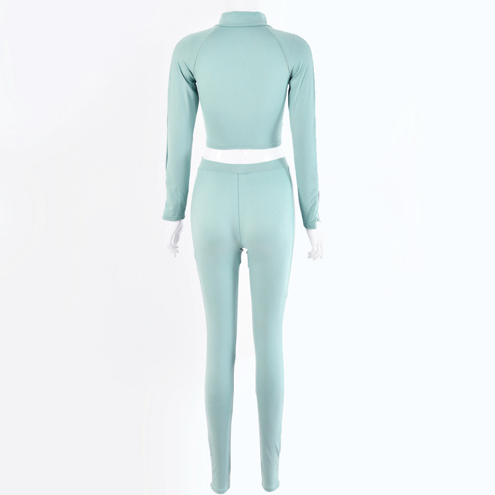 Light blue long-sleeve top and pants set on a white background