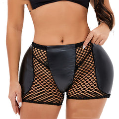 Black fishnet shorts with leather accents worn by a person on a white background