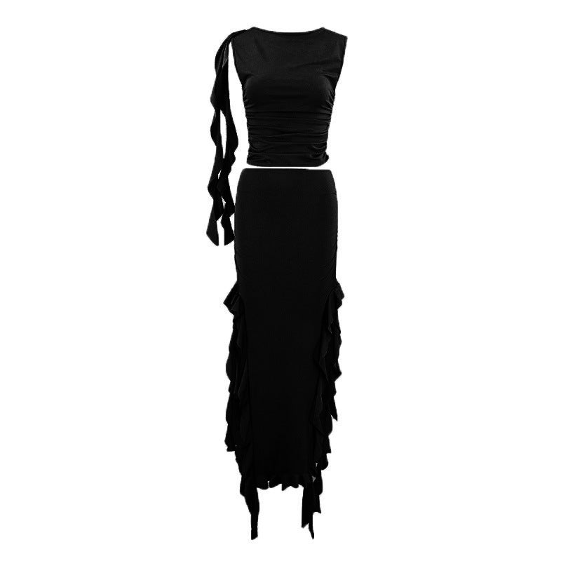 Black top and skirt set on a white background