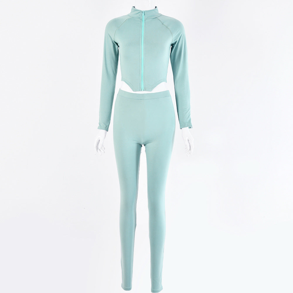 Light blue athletic outfit with long-sleeve top and leggings on a white background