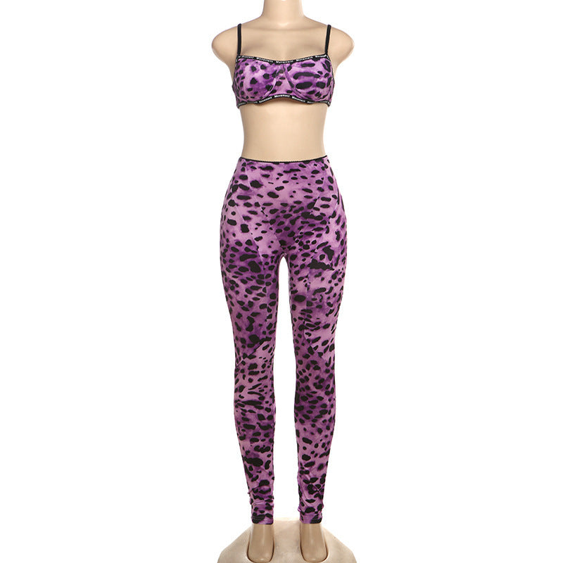 Purple leopard print leggings on a mannequin against a white background